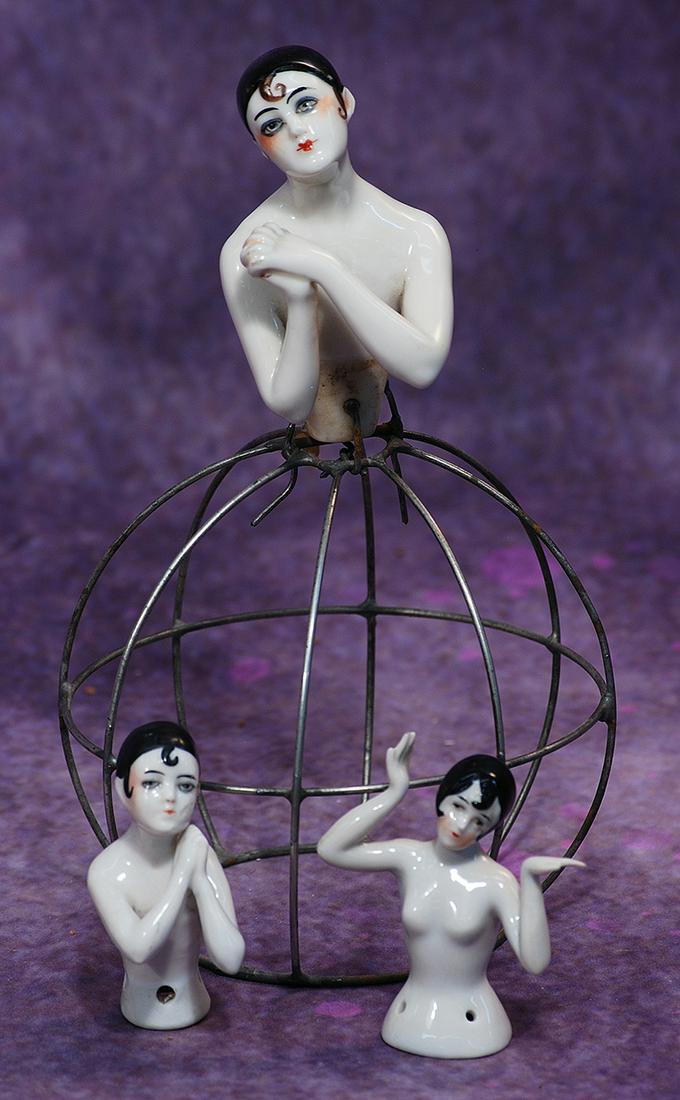 THREE GERMAN PORCELAIN HALF DOLLS AS “PIERROT”. Each is waist-up porcelain nude figure,: THREE GERMAN PORCELAIN HALF DOLLS AS “PIERROT”. Each is waist-up porcelain nude figure, with painted black skull cap and three distinct ringlet curls, heavy eye make-up, arms away from bod