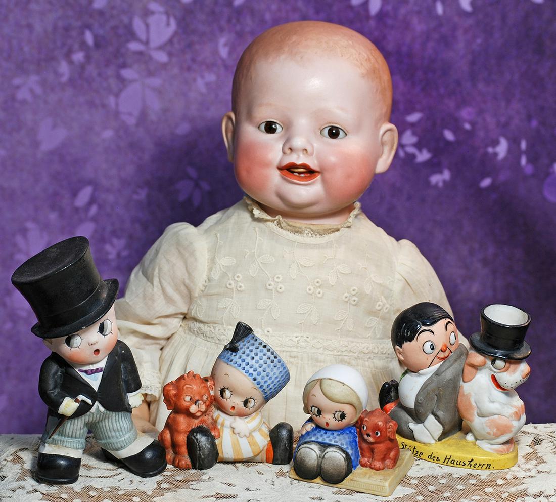 FOUR GERMAN BISQUE COMIC GOOGLY FIGURES.  2 ½” to 5 ½”.   Each is all-bisque (1 of 2)