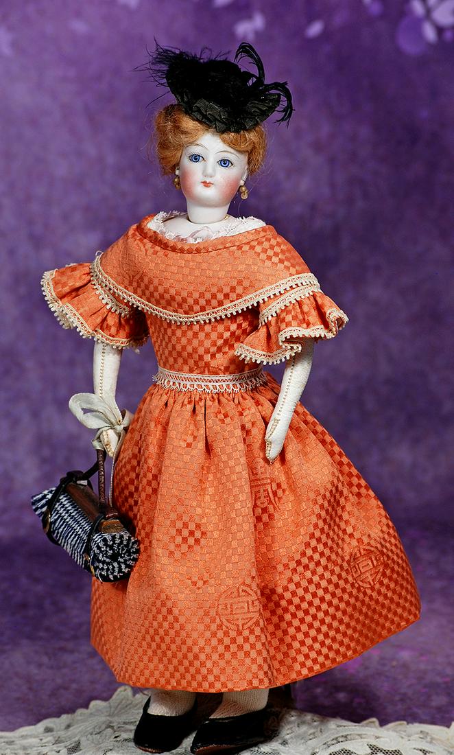 PETITE FRENCH BISQUE POUPEE BY GAULTHIER. 11 ½”. Marks: 0. Bisque swivel head on: PETITE FRENCH BISQUE POUPEE BY GAULTHIER. 11 ½”. Marks: 0. Bisque swivel head on bisque shoulderplate, inset blue paperweight eyes, painted lashes, multi-stroked brows, closed mouth, pierce