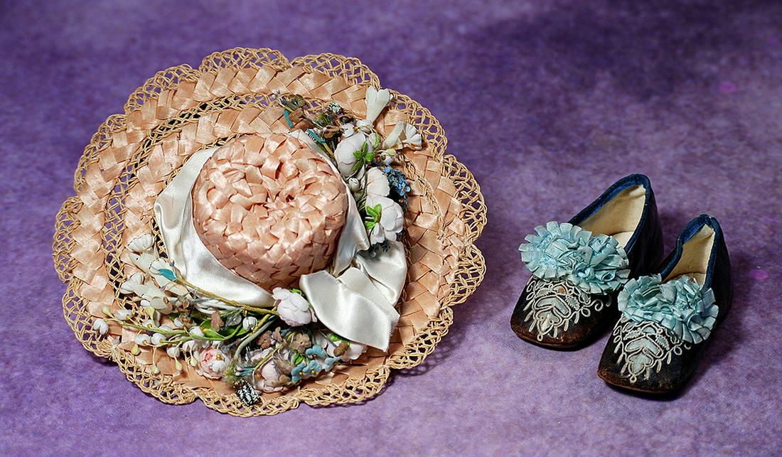 DOLL BONNET.  Fine straw bonnet with intricate woven detail, shaped tall crown and three-inch deep (1 of 2)