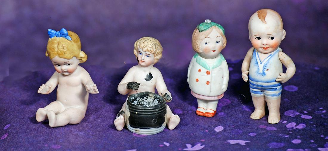 FOUR MINIATURE GERMAN ALL-BISQUE FIGURES.  2 ½” to 3 ½”.  Including: One-piece (1 of 1)