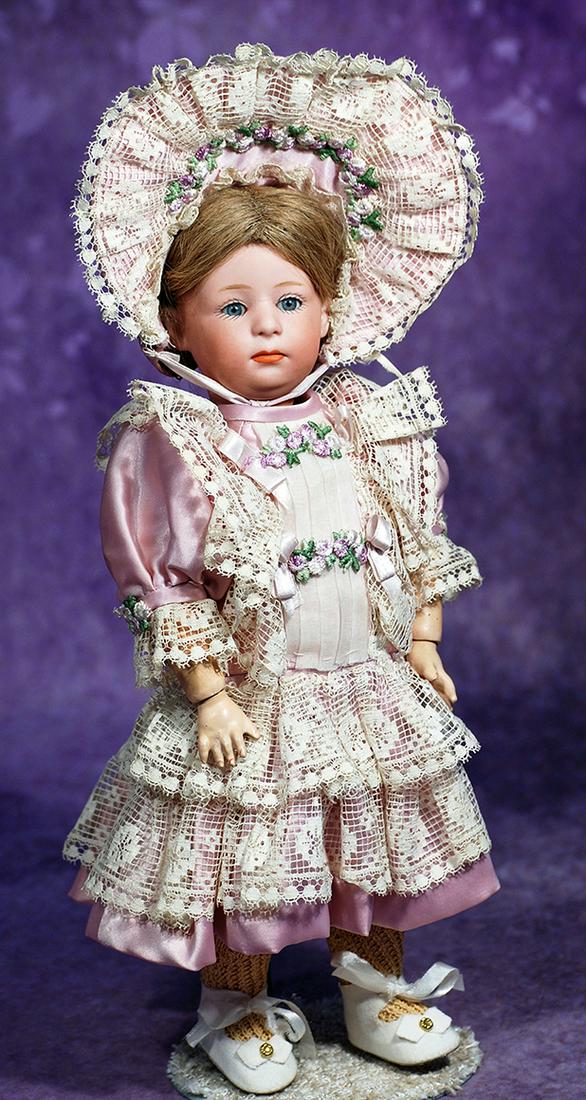 GERMAN BISQUE POUTY CHILD BY GEBRUDER HEUBACH.  12 ½”.  Marks: 6969 Germany 3.  Bisque (1 of 2)