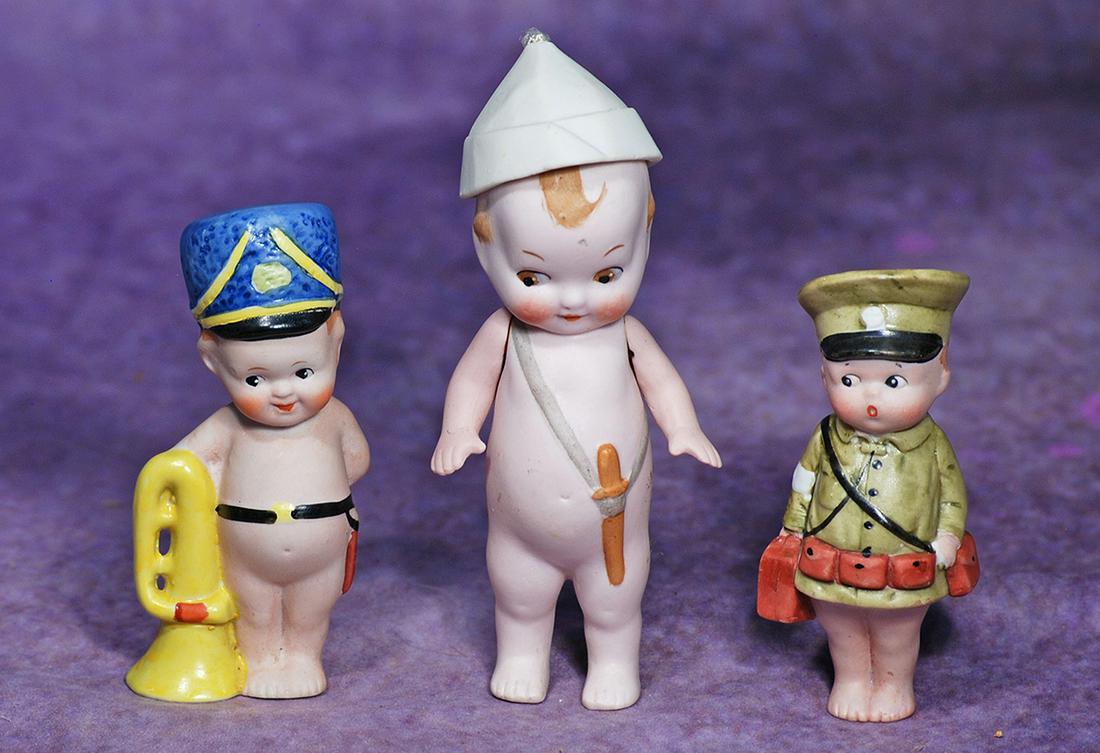 THREE GERMAN BISQUE KEWPIE-TYPE DOLLS.  4” to 6”.  Each is all-bisque with painted (1 of 1)