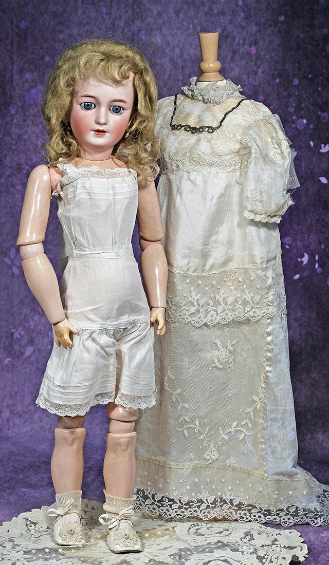 SIMON AND HALBIG BISQUE, 1159, LADY DOLL. 24”. Marks: 1159 Simon & Halbig S & H. Bisque: SIMON AND HALBIG BISQUE, 1159, LADY DOLL. 24”. Marks: 1159 Simon & Halbig S & H. Bisque socket head, blue glass sleep eyes, dark eyeliner, painted lower lashes, brushstroked feathered brows, ope