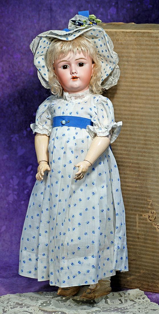 GERMAN BISQUE CHILD BY HANDWERCK.  24”.  Marks: Handwerck 69-12x.  Bisque socket head, brown (1 of 2)