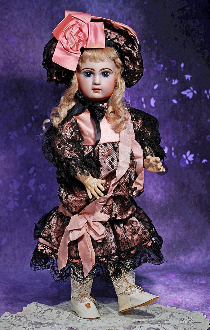 LOVELY BLUE-EYED BEBE BY JUMEAU.  22”.  Marks: Depose Tete Jumeau Bte SGDG 10.  Bisque socket (1 of 2)