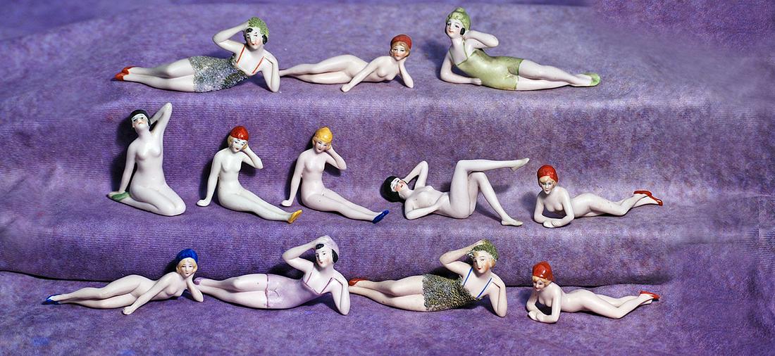 COLLECTION OF TWELVE GERMAN BISQUE BATHING BEAUTIES BY HERTWIG. 2 ¼” to 3 ¾”.: COLLECTION OF TWELVE GERMAN BISQUE BATHING BEAUTIES BY HERTWIG. 2 ¼” to 3 ¾”. Each is pink-tinted all-bisque figure of adult lady as nude or wearing bathing suit, with sculpted s