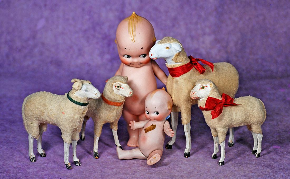 TWO GERMAN BISQUE KEWPIES.  7 ½” Kewpie standing with jointed arms, marked O’Neill (1 of 2)