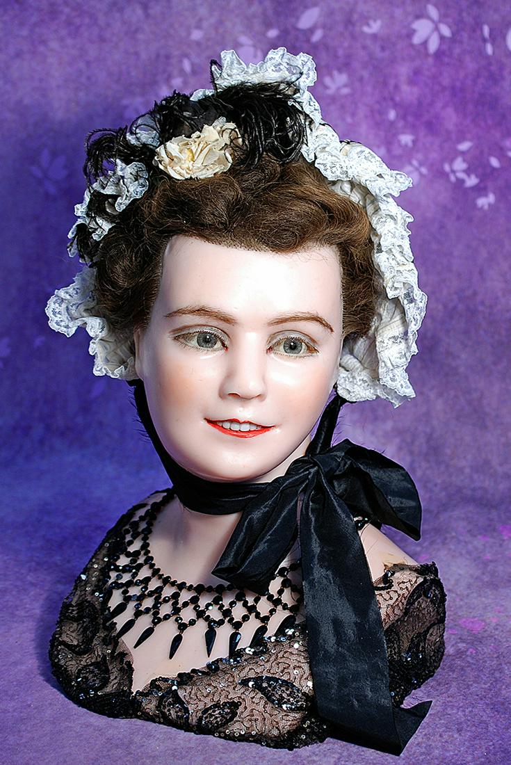 POURED WAX MANNEQUIN HEAD FOR STORE DISPLAY. 15”. Pink-toned turned wax shoulder head on: POURED WAX MANNEQUIN HEAD FOR STORE DISPLAY. 15”. Pink-toned turned wax shoulder head on wooden form, well-defined features, beautiful blue glass eyes, deeply-defined eyelids, applied real eye l