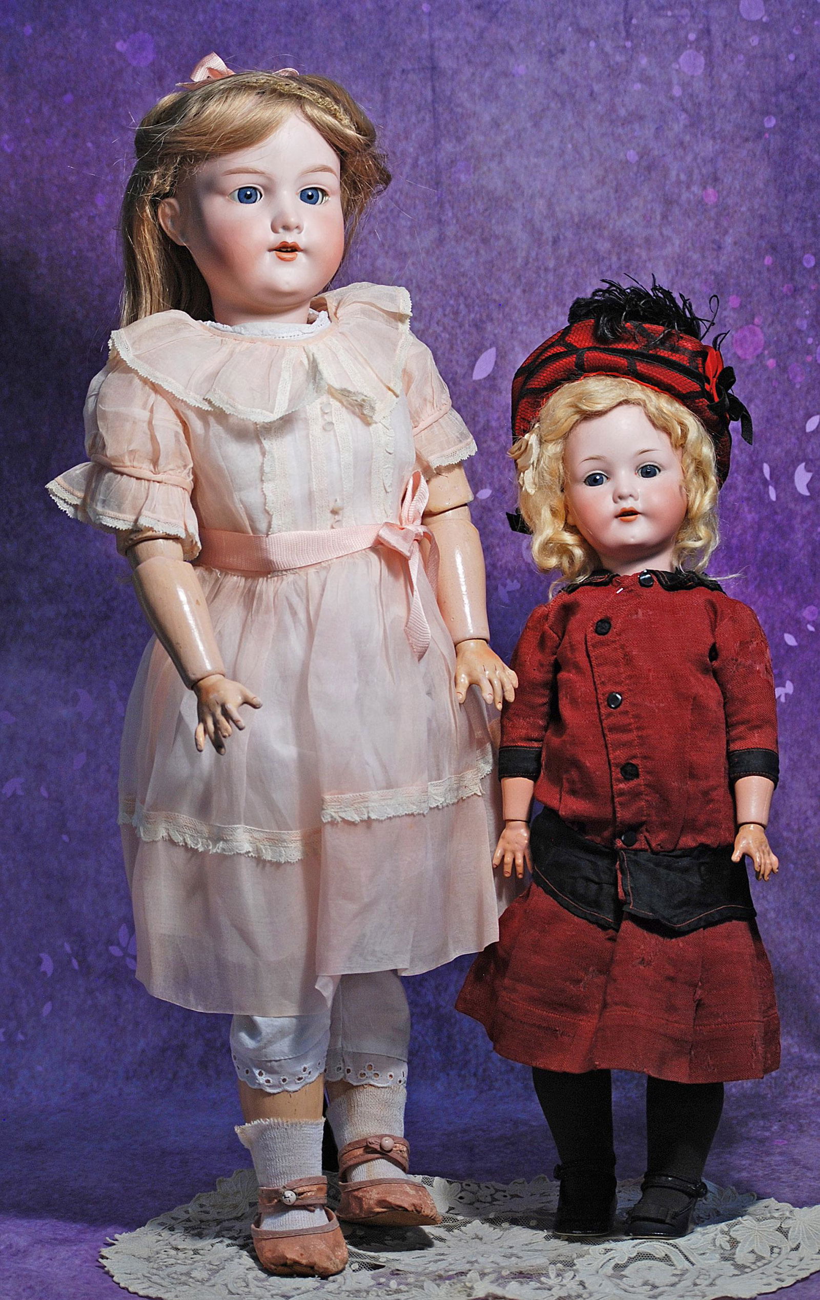 TWO GERMAN BISQUE DOLLS. (1) 19” bisque socket head doll by C.M. Bergmann, stationary blue: TWO GERMAN BISQUE DOLLS. (1) 19” bisque socket head doll by C.M. Bergmann, stationary blue glass eyes, painted lashes, open mouth, upper teeth, original blonde mohair wig, composition ball-joint