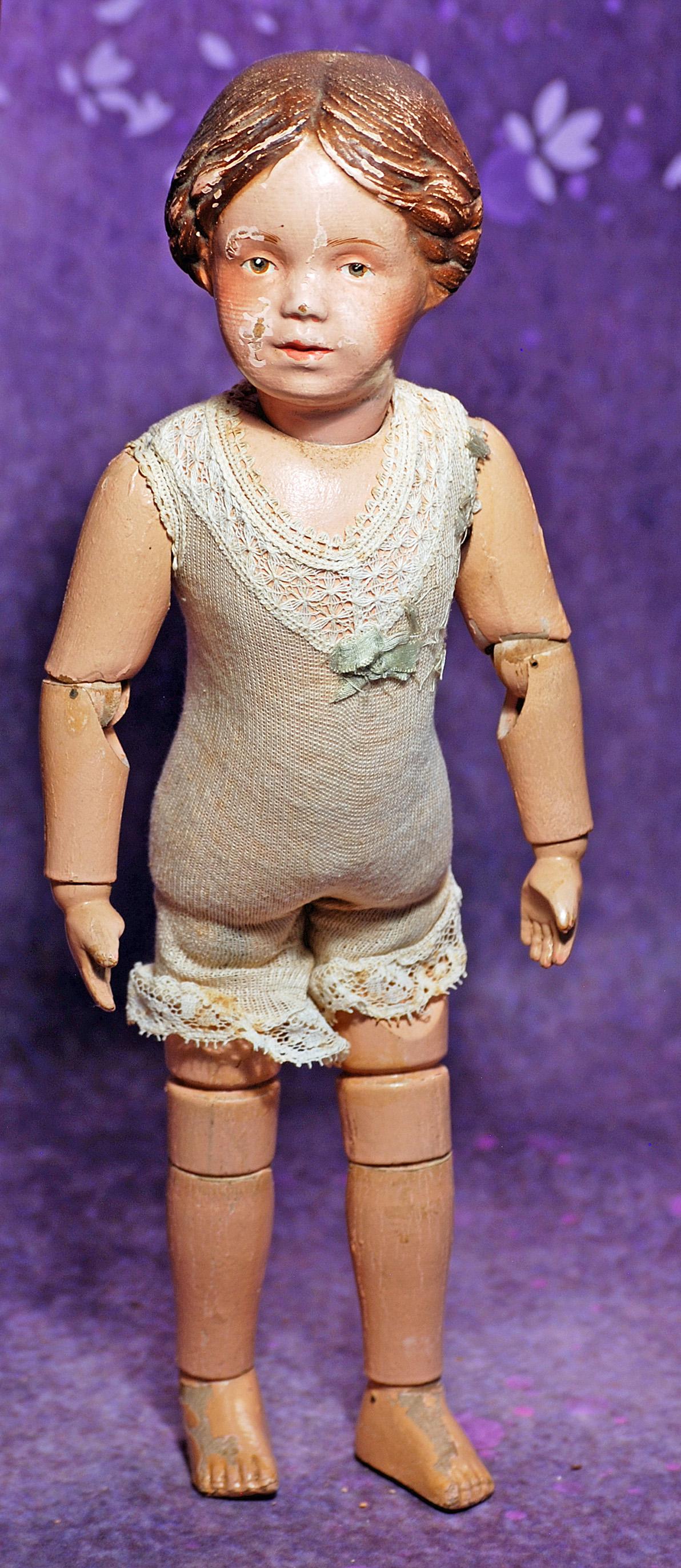 SCHOENHUT CARVED WOODEN GIRL WITH BRAIDS.  14”.  Marks: Schoenhut patent mark on back. Carved (1 of 3)