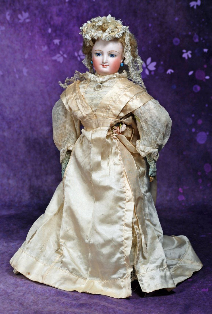 FRENCH BISQUE SMILING POUPEE BY BRU. Marks: F. Bisque swivel head on bisque: FRENCH BISQUE SMILING POUPEE BY BRU. 16”. Marks: F. Bisque swivel head on bisque shoulderplate, inset blue paperweight eyes, eyeliner, painted lashes, feathered brows, pierced ears, pale pink ac