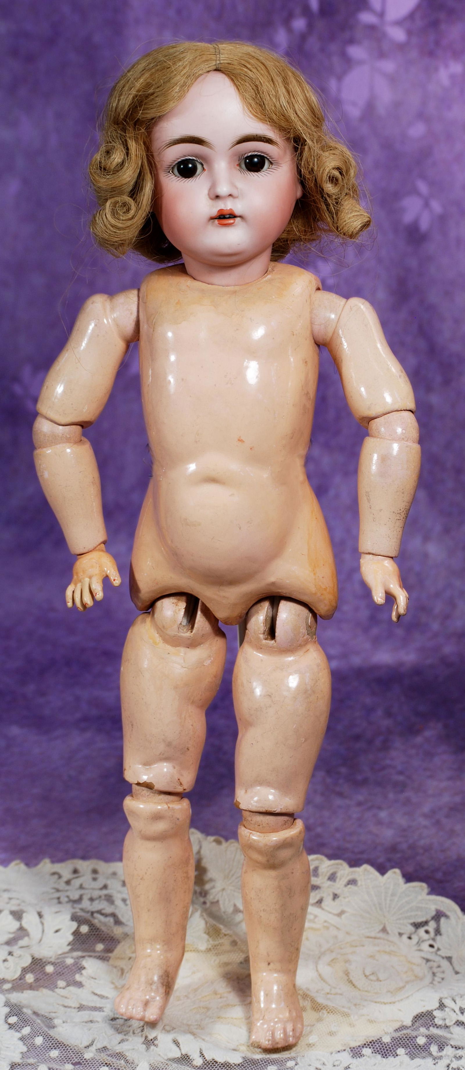 GERMAN BISQUE CHILD BY KESTNER. 17”. Marks: made in Germany 152. Bisque socket head, brown: GERMAN BISQUE CHILD BY KESTNER. 17”. Marks: made in Germany 152. Bisque socket head, brown sleep eyes, painted lashes, feathered brows, open mouth, accented lips, upper teeth, blonde human hair