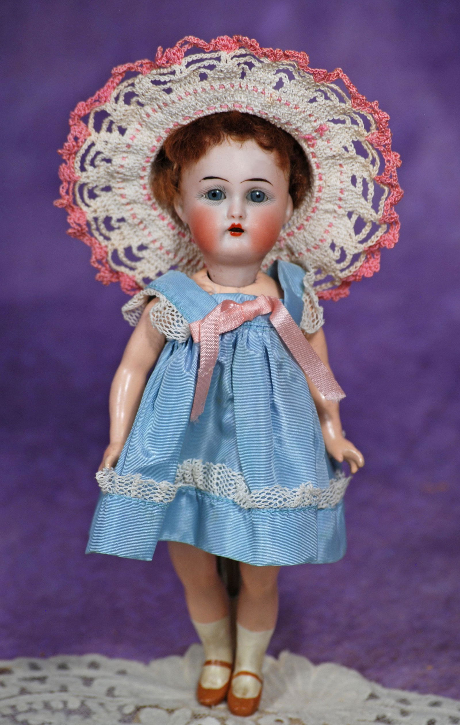 TINY BISQUE FLAPPER DOLL BY KAMMER AND REINHARDT. 8”. Marks: K * R/ Halbig Germany. Bisque: TINY BISQUE FLAPPER DOLL BY KAMMER AND REINHARDT. 8”. Marks: K * R/ Halbig Germany. Bisque socket head, blue slep eyes, painted lashes, tapered brows, open mouth, upper teeth, brown lambs wool w