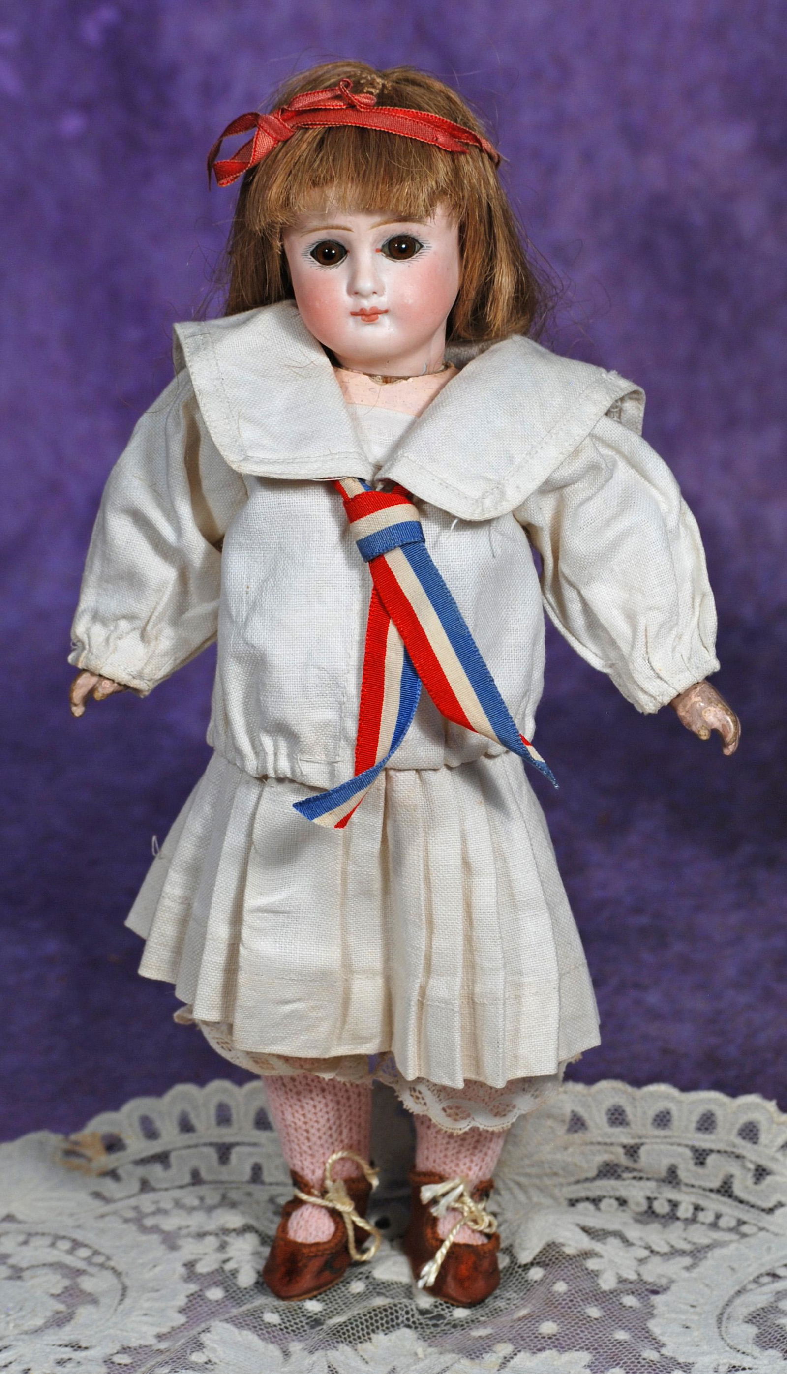 GERMAN BELTON-TYPE BISQUE DOLL.  11 ½”.  Marks: 106.  Solid-dome bisque socket head with (1 of 1)