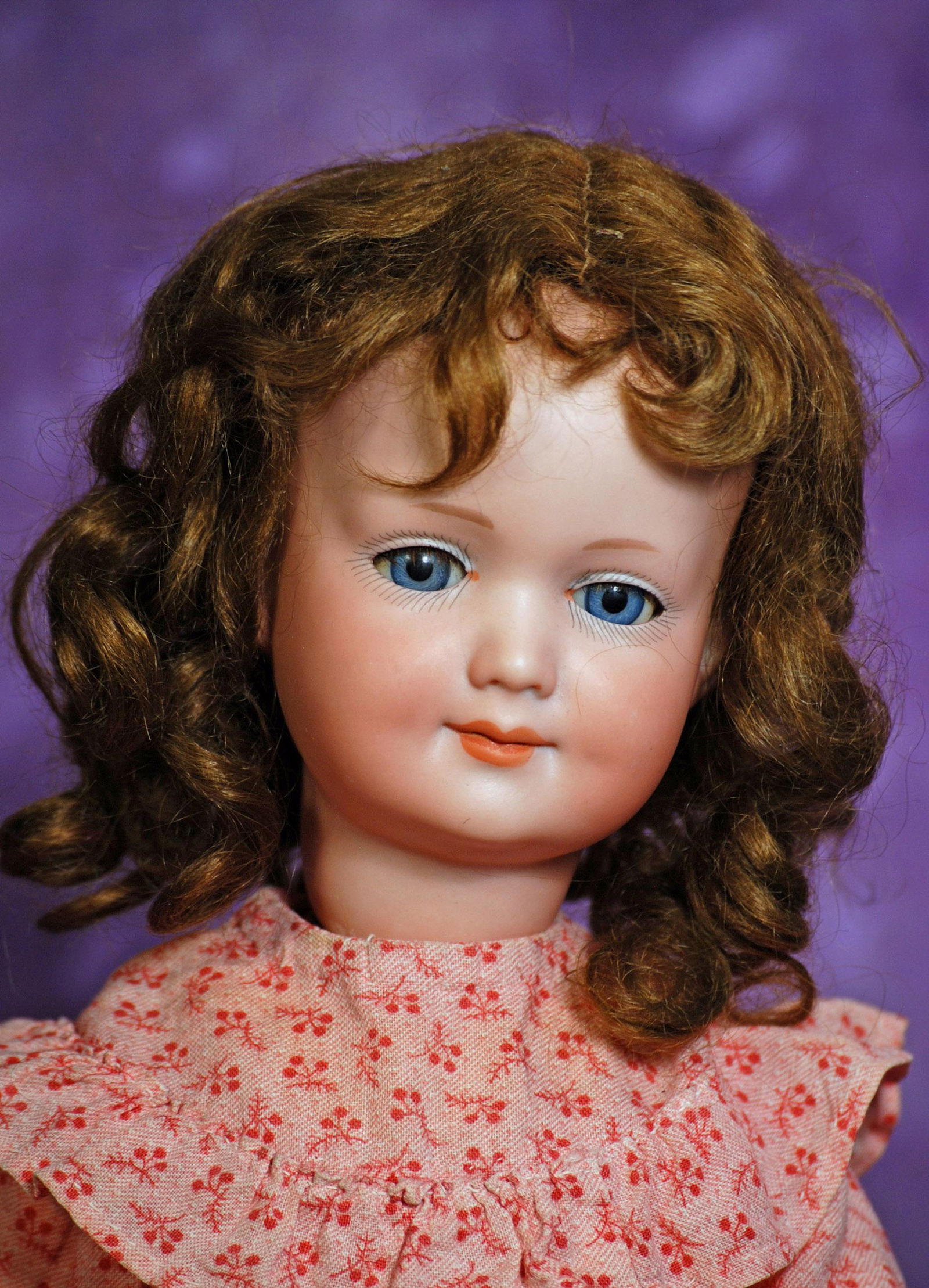 GERMAN BISQUE GLASS-EYED SMILING CHARACTER BY MARSEILLE. 18”.  Marks: Germany 550 A 4 M DRGM. (1 of 2)