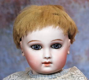 EARLY FRENCH BISQUE BLUE-EYED PREMIERE BEBE BY EMILE JUMEAU.