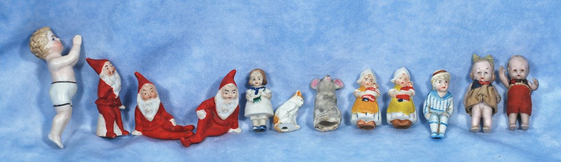 COLLECTION OF TWELVE MINIATURE ALL-BISQUE FIGURES (1 of 1)