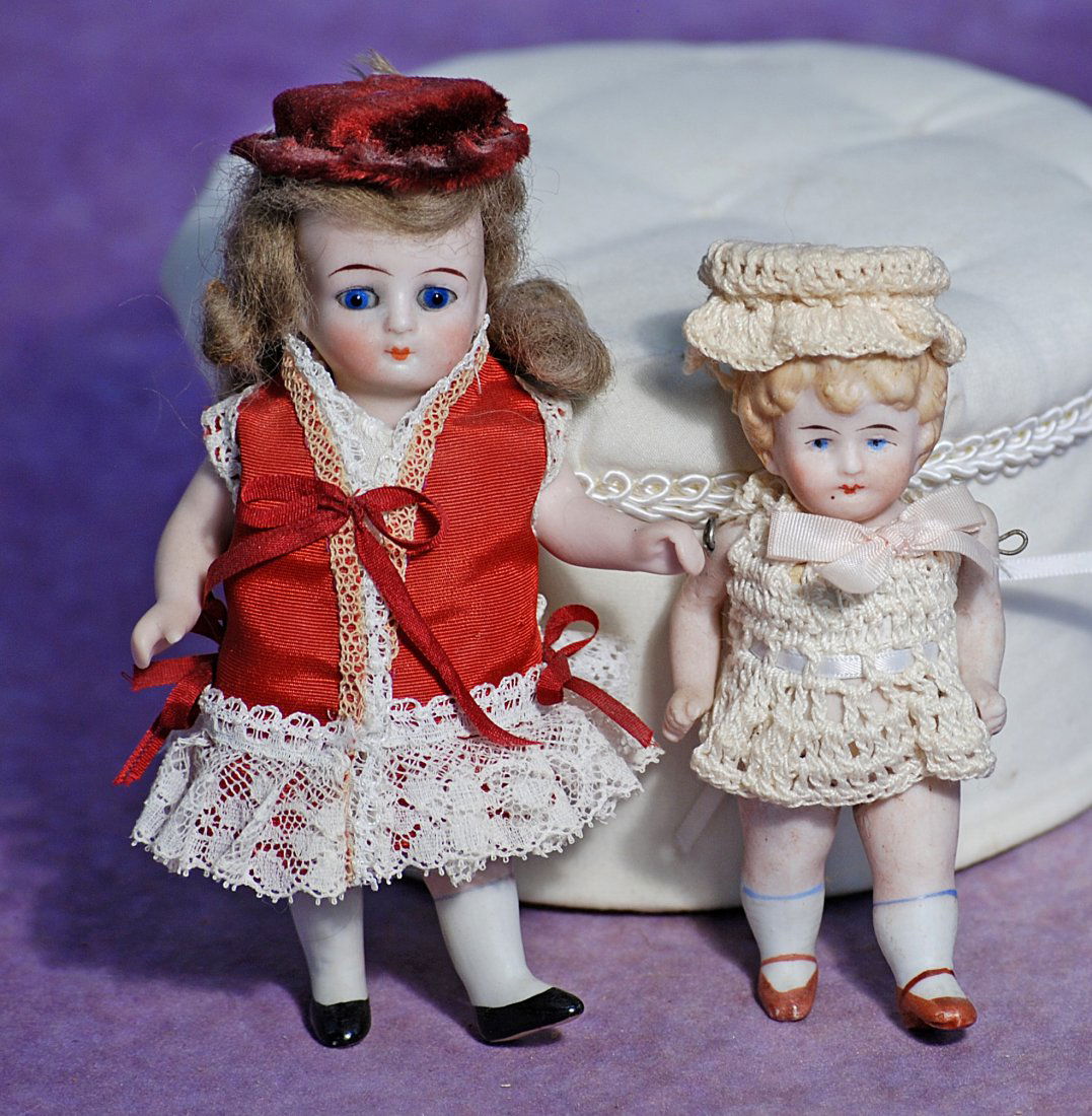 TWO GERMAN ALL-BISQUE DOLLS. (1 of 1)