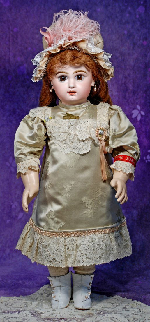 BEAUTIFUL FRENCH BISQUE BEBE BY JUMEAU.: BEAUTIFUL FRENCH BISQUE BEBE BY JUMEAU. 26”. Marks: Tete Jumeau bte SGDG Depose 11. Bisque socket head, deep brown paperweight eyes, eyeliner, painted lashes, feathered brows, pierced ears, clos