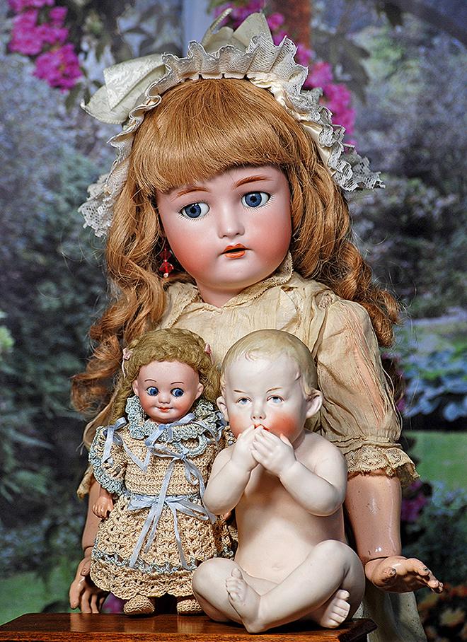 GERMAN BISQUE DOLL WITH FLIRTY EYES BY KAMMER AND REINHARDT. 23”. Marks: Simon & Halbig, K *: GERMAN BISQUE DOLL WITH FLIRTY EYES BY KAMMER AND REINHARDT. 23”. Marks: Simon & Halbig, K * R. Bisque socket head, blue flirty and sleeping eyes, painted lashes, feathered brows, pierced ears,
