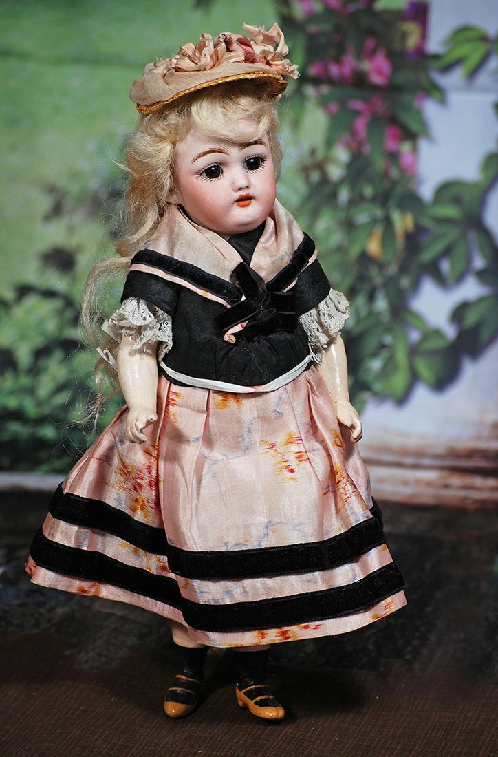 PETITE GERMAN BISQUE CHILD BY SIMON & HALBIG. 9 ½”. Marks: 1078 Germany Halbig S & H.: PETITE GERMAN BISQUE CHILD BY SIMON & HALBIG. 9 ½”. Marks: 1078 Germany Halbig S & H. Bisque socket head, brown sleep eyes, painted lashes, feathered brows, open mouth, upper teeth, origina