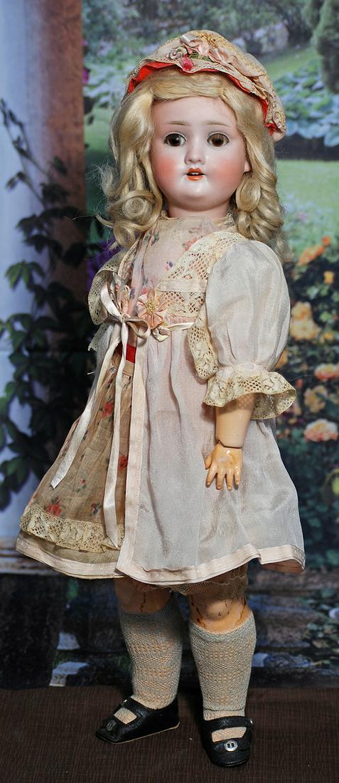 GERMAN BISQUE DOLL BY KLEY AND HAHN. 18”. Marks: K H 250. Bisque socket head, brown sleep: GERMAN BISQUE DOLL BY KLEY AND HAHN. 18”. Marks: K H 250. Bisque socket head, brown sleep eyes, painted and applied lashes, feathered brows, open mouth, upper teeth, original blonde mohair wig,