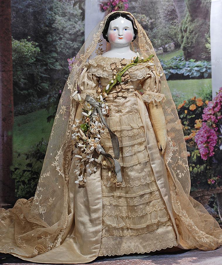 GERMAN CHINA PORCELAIN LADY IN BRIDAL ENSEMBLE.  23”.  Porcelain shoulderhead with sculpted (1 of 2)