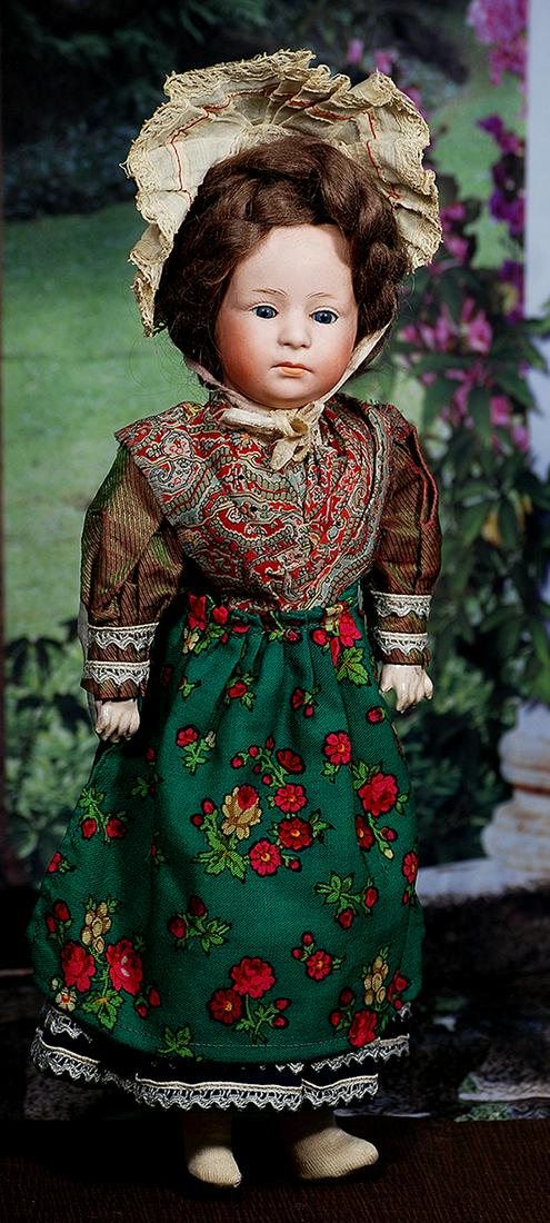 GERMAN BISQUE GLASS-EYED POUTY CHILD BY HEUBACH.  13”.  Marks: 6969.  Pink-tinted bisque (1 of 2)