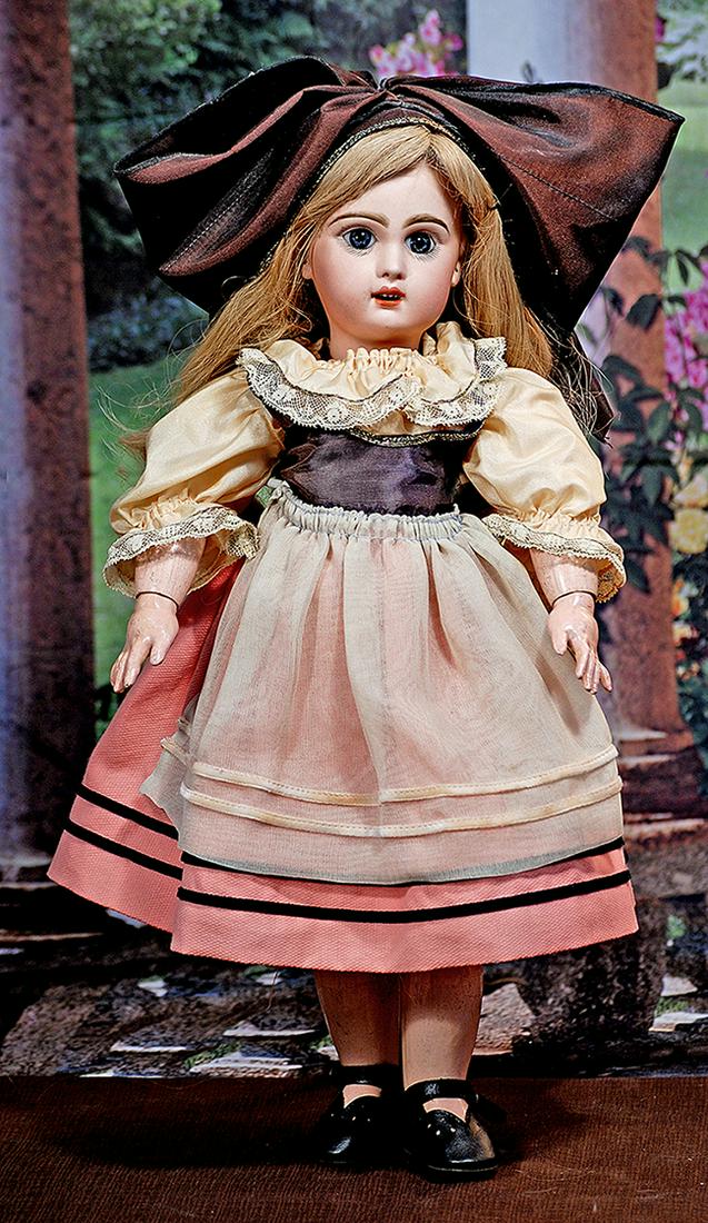 PRETTY FRENCH BISQUE BEBE BY JUMEAU. 18”. Marks: None. Bisque socket head, blue paperweight: PRETTY FRENCH BISQUE BEBE BY JUMEAU. 18”. Marks: None. Bisque socket head, blue paperweight eyes, painted lashes, feathered brows, pierced ears, open mouth, shaded and accented lips, upper teeth