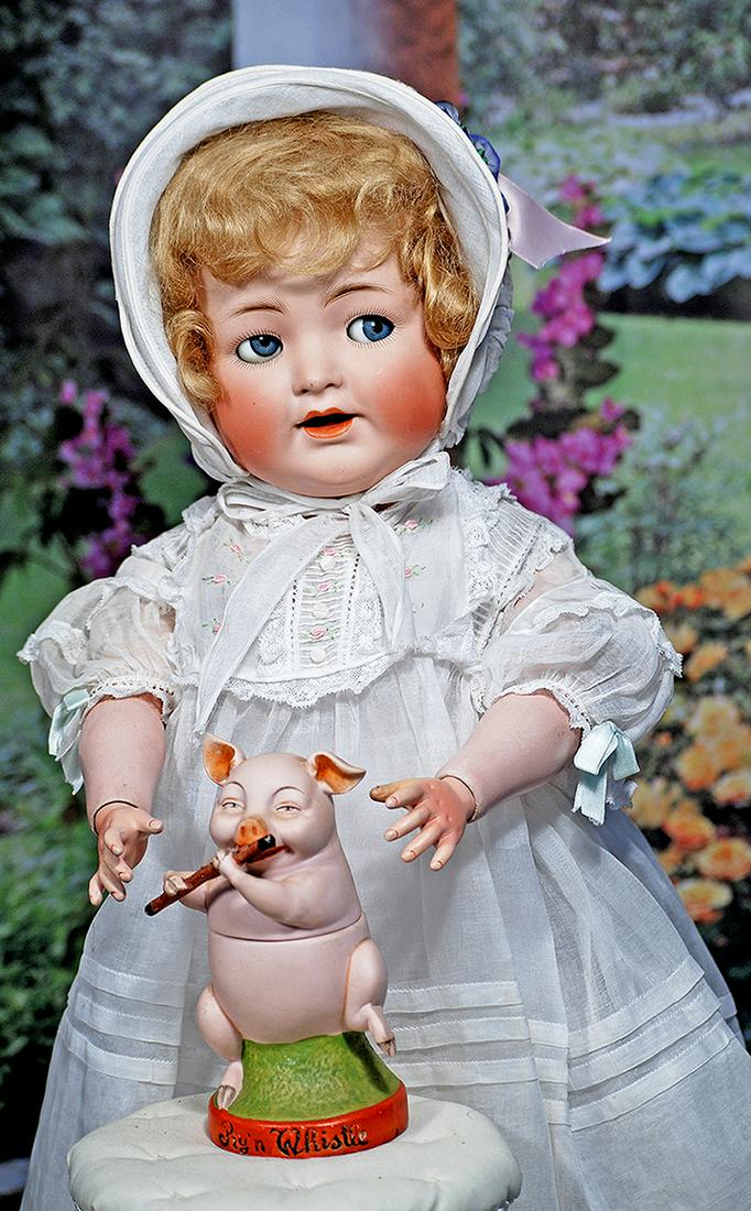 GERMAN BISQUE FLIRTY-EYED TODDLER BY KAMMER AND REINHARDT. 19”. Marks: K * R Simon & Halbig: GERMAN BISQUE FLIRTY-EYED TODDLER BY KAMMER AND REINHARDT. 19”. Marks: K * R Simon & Halbig 126. Bisque socket head, blue glass sleep and “flirty” eyes, painted lashes, feathered bro