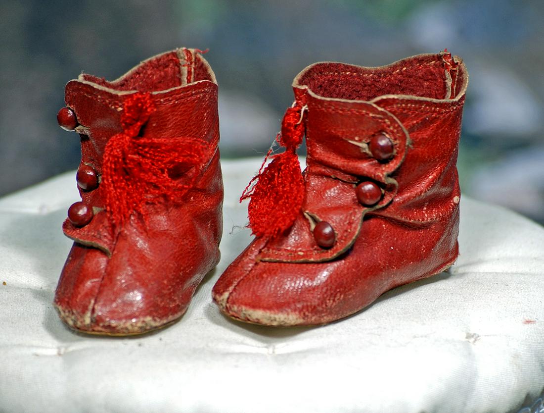 PAIR OF ANTIQUE RED LEATHER DOLL BOOTS.  2 ¼”.  Rich red leather ankle boots with (1 of 1)