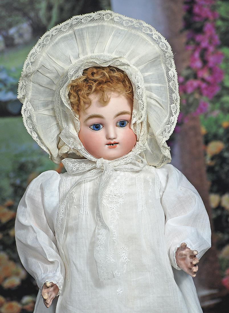 FRENCH BISQUE BEBE GIGOTEUR BY JULES STEINER. 17 ½”. Marks: None. Solid domed bisque: FRENCH BISQUE BEBE GIGOTEUR BY JULES STEINER. 17 ½”. Marks: None. Solid domed bisque head with flat-cut neck socket, rounded face, blue glass paperweight inset eyes, eyeliner, painted lashe