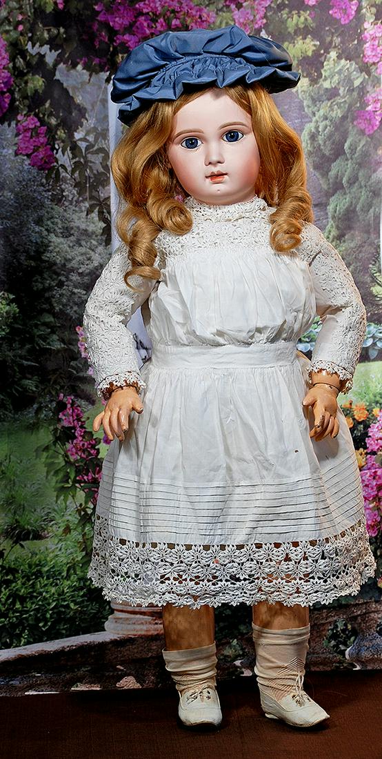 GRAND SIZE “INCISED DEPOSE” BEBE BY EMILE JUMEAU. 30”. Marks: Depose Jumeau 14: GRAND SIZE “INCISED DEPOSE” BEBE BY EMILE JUMEAU. 30”. Marks: Depose Jumeau 14 (incised). Bisque socket head, deep blue glass paperweight inset eyes, dark eyeliner, painted lashes, r