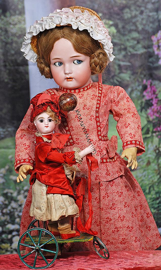 GERMAN BISQUE FLIRTY-EYED CHILD BY KAMMER AND REINHARDT. 17”. Marks: Simon & Halbig, K * R.: GERMAN BISQUE FLIRTY-EYED CHILD BY KAMMER AND REINHARDT. 17”. Marks: Simon & Halbig, K * R. Bisque socket head, blue flirty and sleep eyes, painted lashes, eyeliner, feathered brows, pierced ear