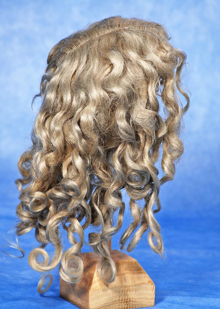 ANTIQUE MOHAIR DOLL WIG.  Ash blonde mohair wig with center part and soft waves and curls falling (1 of 1)