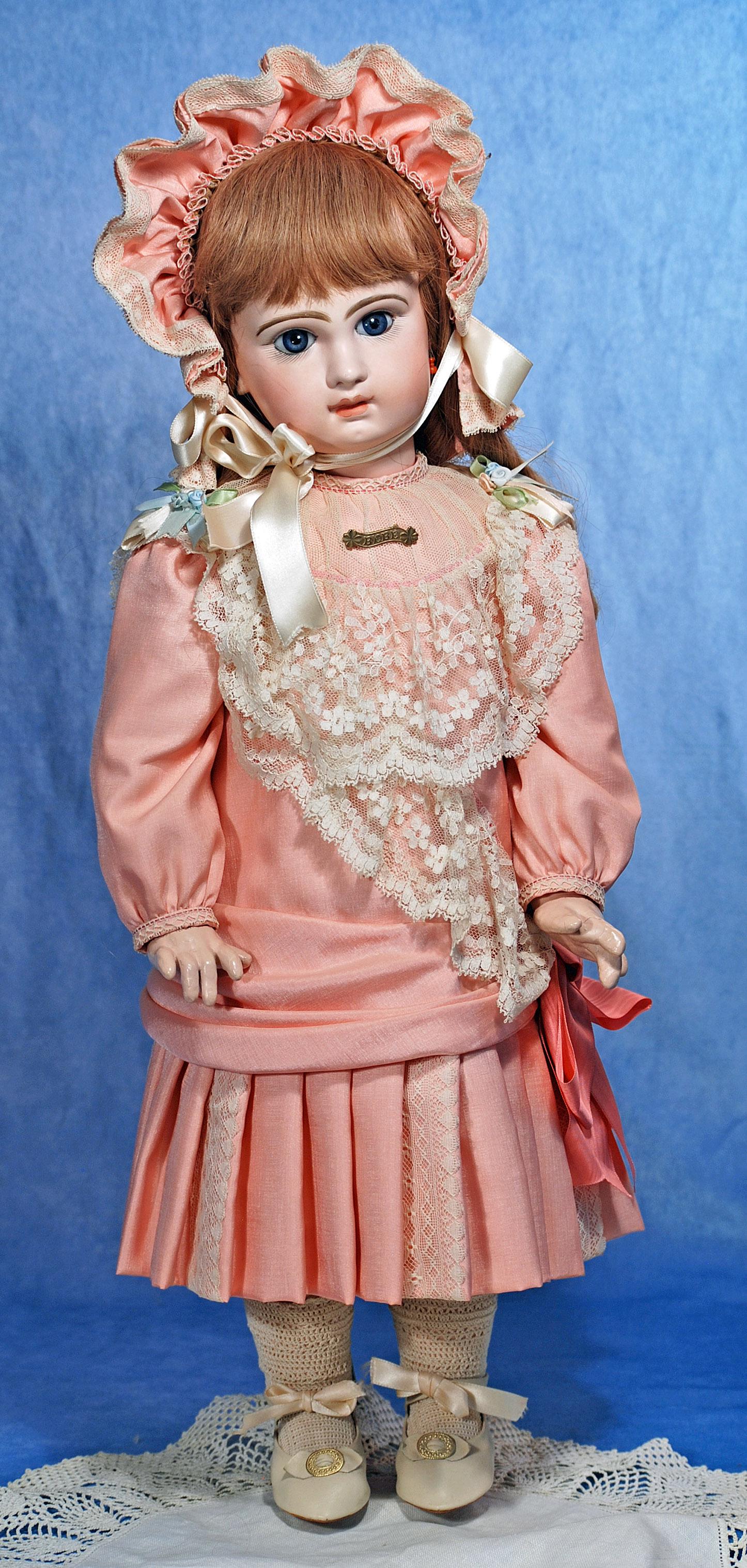 FRENCH BISQUE BEBE BY JUMEAU.  24”.  Marks: Depose Tete Jumeau Bte SGDG 14.  Bisque socket (1 of 2)