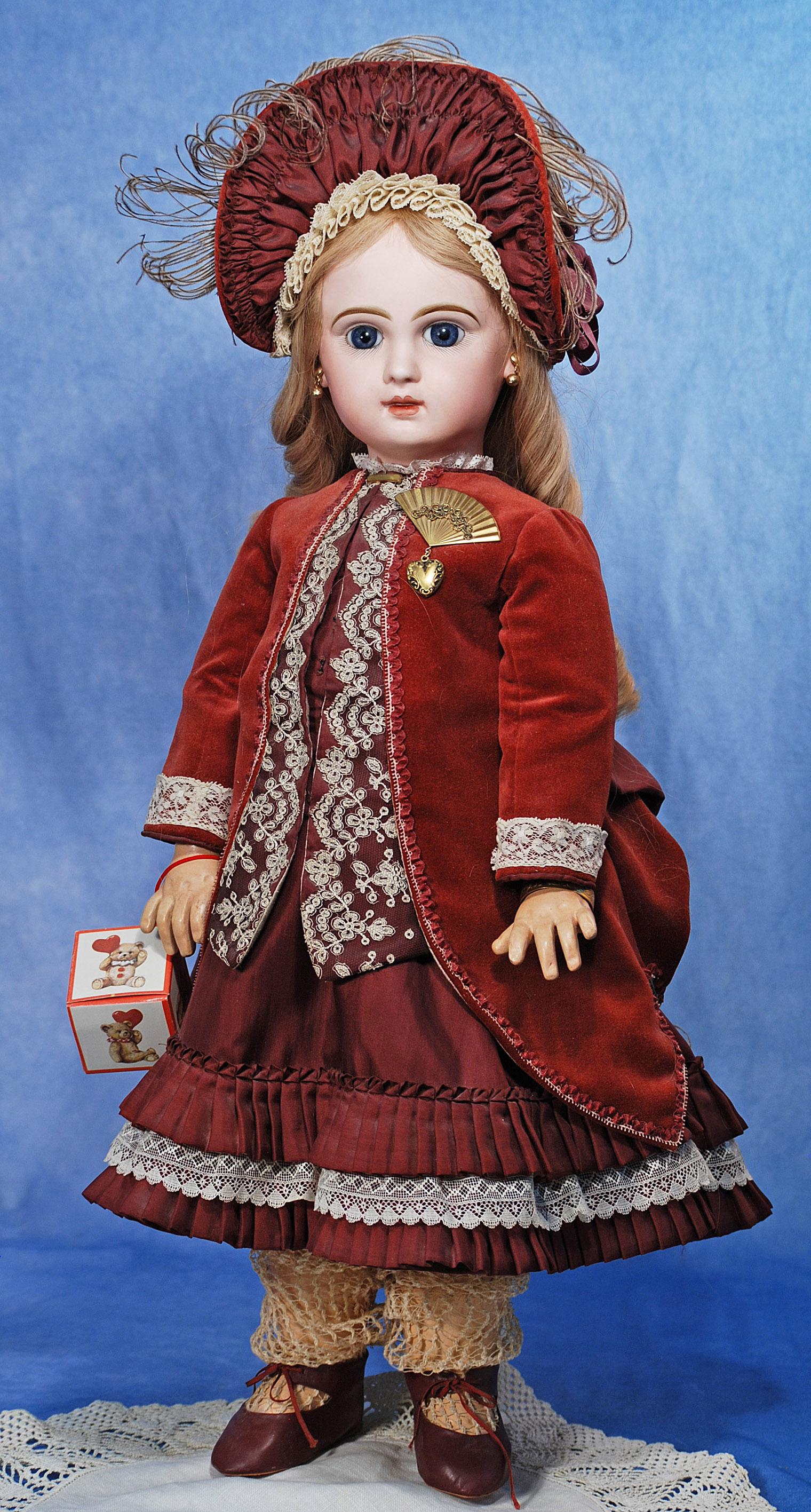 FRENCH BISQUE BEBE BY JUMEAU. 24”. Marks: Tete Jumeau Depose Bte SGDG. Bisque socket head,: FRENCH BISQUE BEBE BY JUMEAU. 24”. Marks: Tete Jumeau Depose Bte SGDG. Bisque socket head, blue paperweight eyes, painted lashes, eyeliner, feathered and brushstroked brows, pierced ears, closed