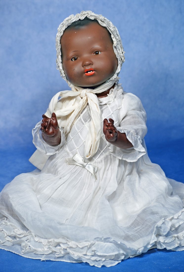 GERMAN BROWN BISQUE BABY BY MARSEILLE..: GERMAN BROWN BISQUE BABY BY MARSEILLE. 18”. Marks: A.M. Germany 351. Solid dome brown bisque socket head, painted black hair, brown sleep eyes, open mouth, two lower teeth, brown composition bab