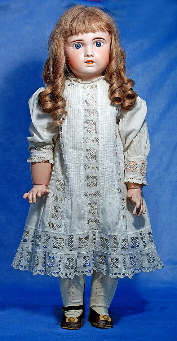 LOVELY FRENCH BISQUE BEBE 1907 BY JUMEAU: LOVELY FRENCH BISQUE BEBE 1907 BY JUMEAU. 30”. Marks: 14. Bisque socket head, blue paperweight eyes, painted lashes, eyeliner, feathered brows, pierced ears, open mouth, accented lips, upper tee