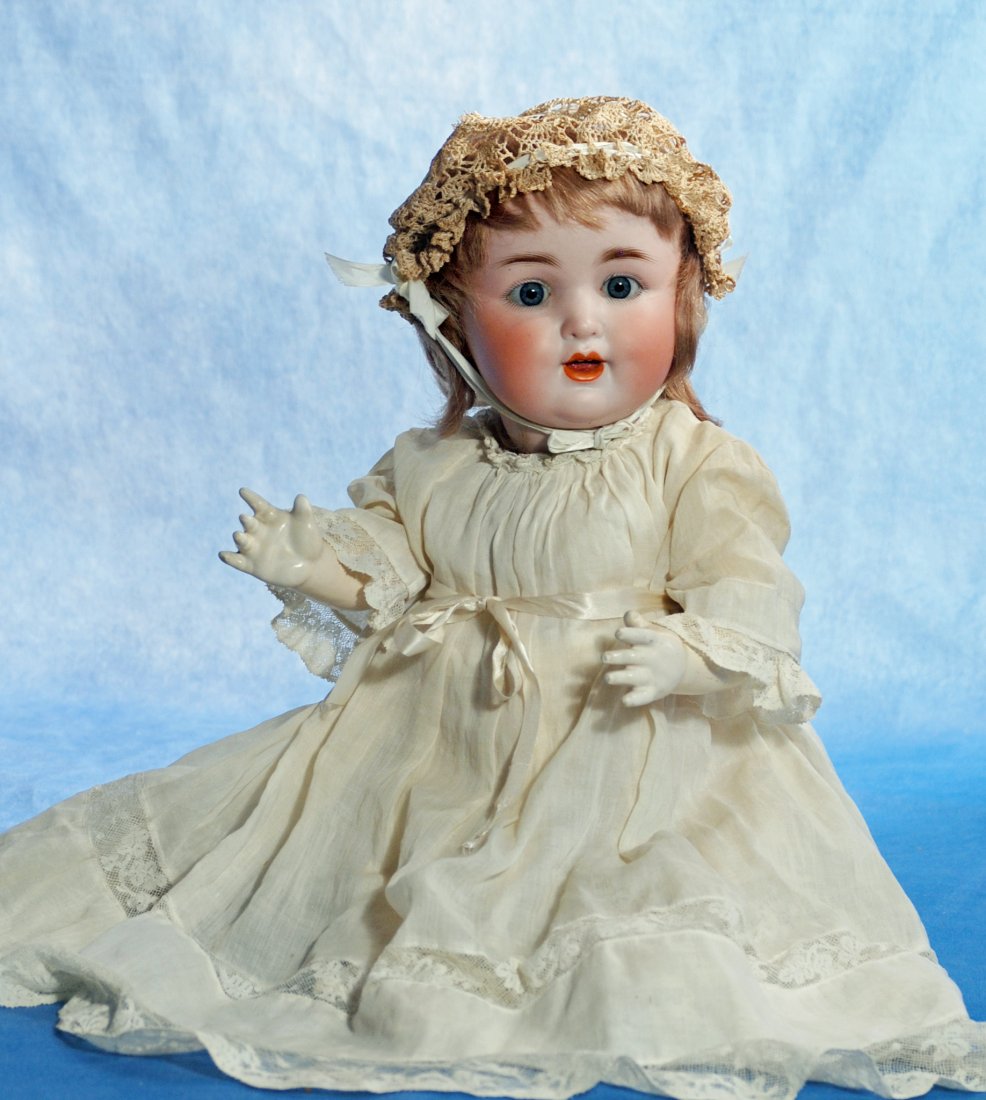 GERMAN BISQUE CHARACTER BY CATTERFELDER PUPPENFABRIK: GERMAN BISQUE CHARACTER BY CATTERFELDER PUPPENFABRIK. 17”. Marks: 201 Germany. Bisque socket head, blue sleep eyes, painted lashes, feathered brows, deep dimples, two upper teeth, light brown hu
