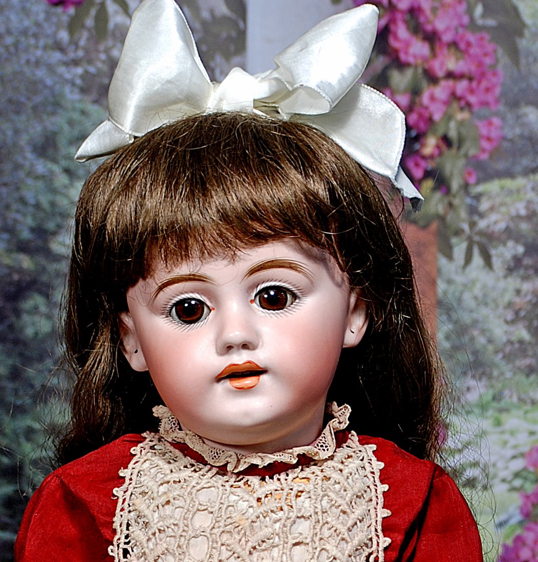 GERMAN BISQUE CHILD BY SIMON & HALBIG.: GERMAN BISQUE CHILD BY SIMON & HALBIG. 24”. Marks: S 12 H, 1009 Dep. Bisque socket head, brown sleep eyes, painted lashes, feathered brows, pierced ears, open mouth, shaded and accented lips, up