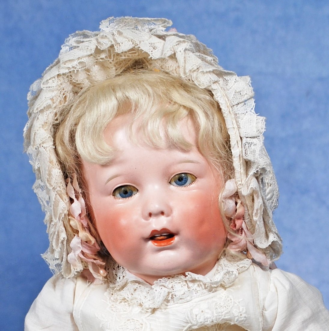 FRENCH BISQUE CHARACTER, 251, BY S.F.B.J.: FRENCH BISQUE CHARACTER, 251, BY S.F.B.J. 20”. Marks: SFBJ 251 Paris. Bisque socket head, blue sleep eyes, painted lower lashes, applied upper lashes, feathered brows, dimpled cheeks, open mouth