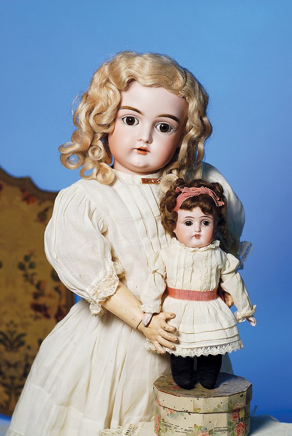 RARE TINY GERMAN BISQUE DOLL BY KESTNER. Marks: D: RARE TINY GERMAN BISQUE DOLL BY KESTNER. Marks: Dep 154. 8”. Bisque shoulderhead, brown sleep eyes, painted lashes, tapered brows, open mouth, square-cut upper teeth, brown mohair wig over plaster p