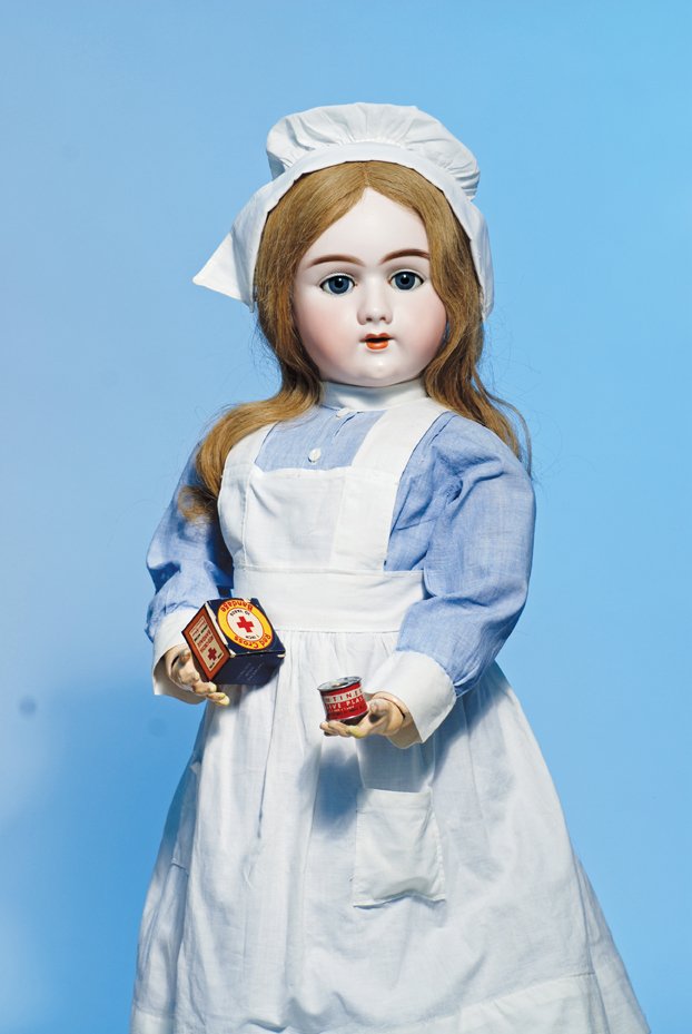 GERMAN HANDWERCK BISQUE DOLL IN ORIGINAL NURSE UN: GERMAN HANDWERCK BISQUE DOLL IN ORIGINAL NURSE UNIFORM. Marks: 109 Dep 15. 30”. Bisque socket head, blue sleep eyes, painted lashes, feathered brows, pierced ears, open mouth, shaded and accented li