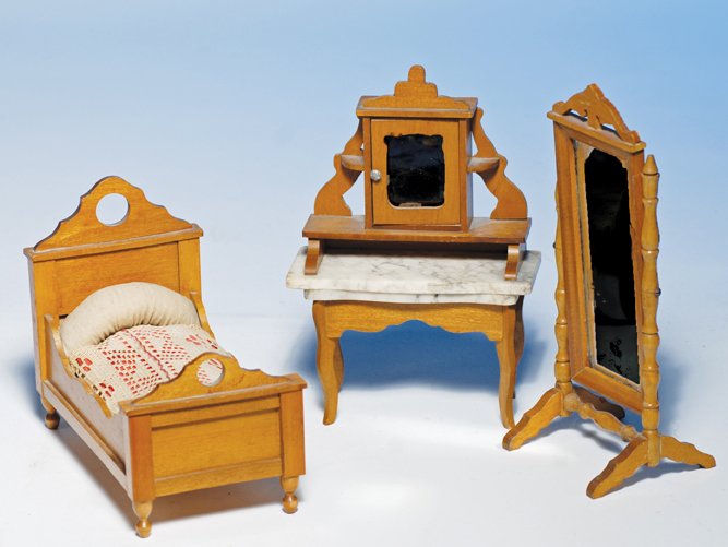 GERMAN WOODEN DOLL HOUSE BEDROOM FURNITURE SET. M: GERMAN WOODEN DOLL HOUSE BEDROOM FURNITURE SET. Maple wood furnishings include 5” H. carved bed with headboard, footboard and side rails, mattress, pillow and lace cover; 6 ½” cheval style mirror