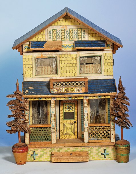 R. BLISS PAPER OVER LITHOGRAPHED WOOD DOLLHOUSE &: R. BLISS PAPER OVER LITHOGRAPHED WOOD DOLLHOUSE & GERMAN LOUFA TREES. 17” H. x 11 W. Two-story house has steeple roof, front porch with metal railing, metal balustrade, eight windows with isinglass 