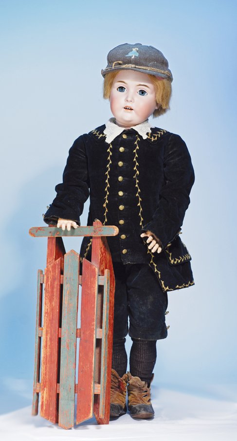 ANTIQUE WOODEN SLED. 18” L. Hand carved wooden sl: ANTIQUE WOODEN SLED. 18” L. Hand carved wooden sled with original red and green painted finish. Commentary: Finish showing wear, overall good condition.