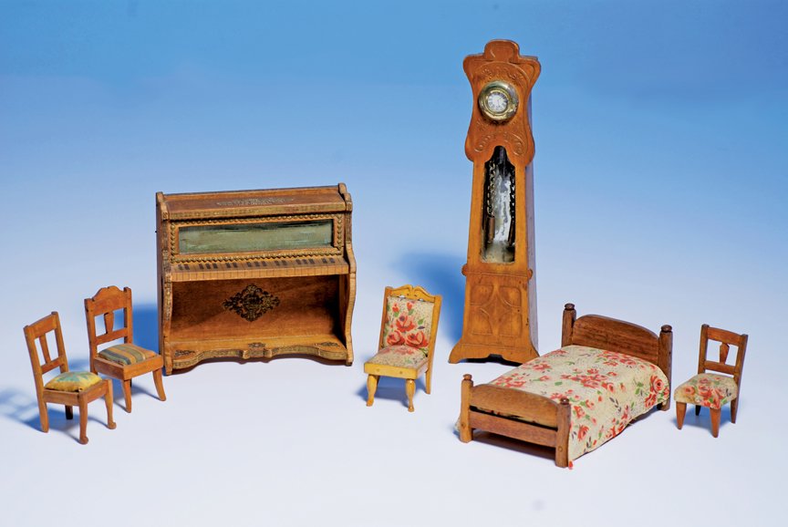 ANTIQUE GERMAN DOLL HOUSE FURNISHING GROUP. All o: ANTIQUE GERMAN DOLL HOUSE FURNISHING GROUP. All of honey-toned wood. Includes 8 ½” grandfather clock with embossed front decoration, gilt framed clock face, pendulum and weights (missing glass fron