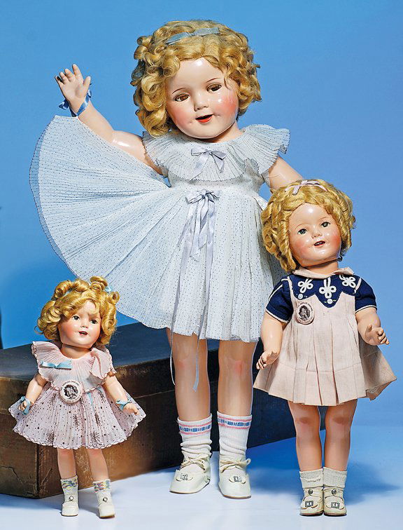 LARGE, FLIRTY-EYED COMPOSITION SHIRLEY TEMPLE BY: LARGE, FLIRTY-EYED COMPOSITION SHIRLEY TEMPLE BY IDEAL. Marks: Shirley Temple copr. Ideal N & T. 27”. Composition socket head, five-piece jointed body, flirty and sleep eyes, applied and painted las